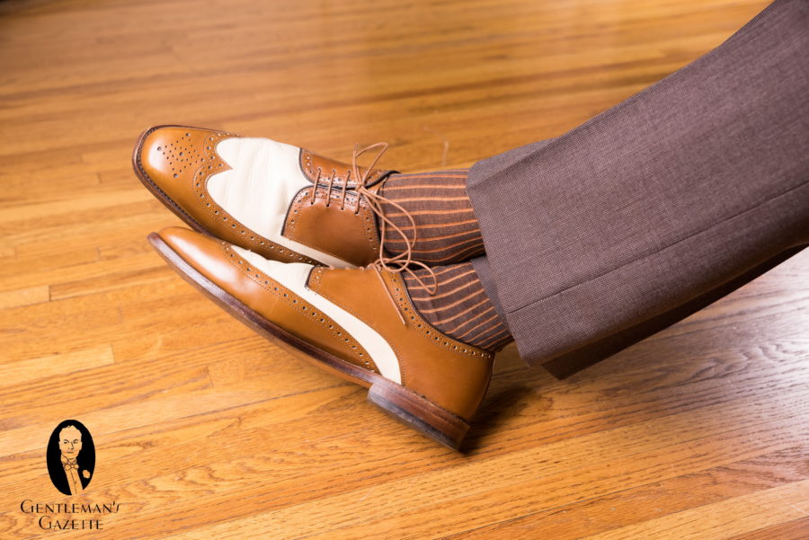 Proper coordination of socks, shoes, and trousers is important for a dapper look